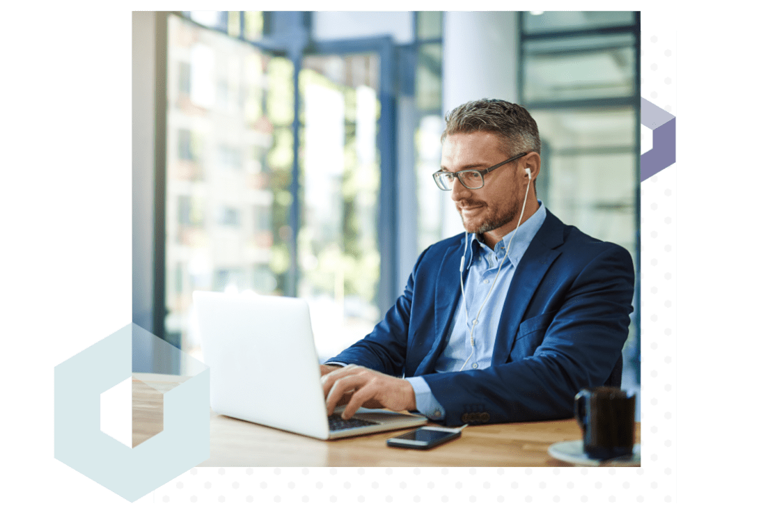 IT Professional working on his laptop, collaborating with different branches and teams with session transfer and agent collaboration tools.