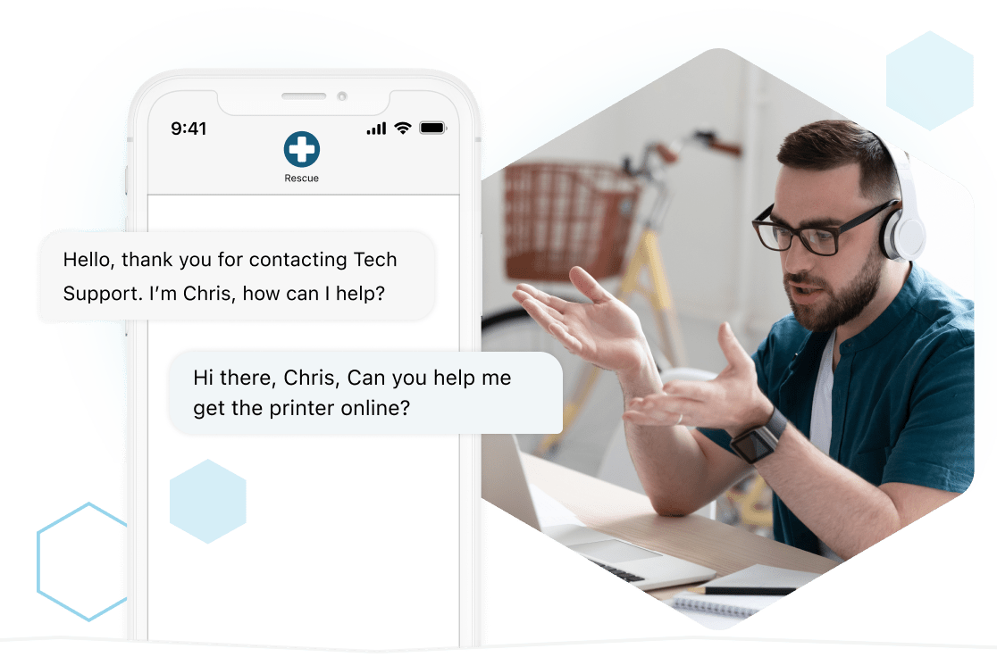 A man wearing a headset provides remote services to users via Rescue’s remote computer repair software.
